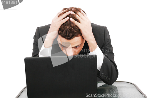 Image of Worried businessman with paperwork stressful businesslife