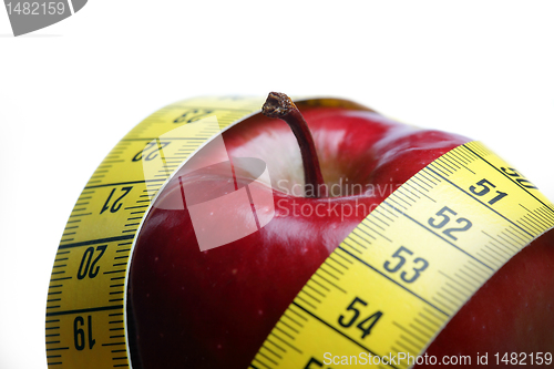 Image of Red apple with measurement isolated on white 