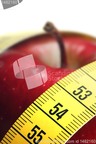 Image of 	Red apple with measurement isolated on white