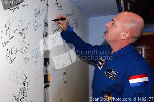 Image of Signing a Poster