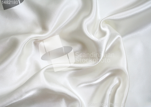 Image of Smooth elegant white silk as background 