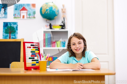 Image of Schoolgirl doing homework