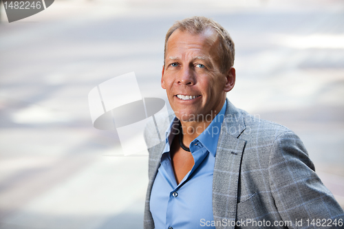 Image of Portrait of businessman smiling