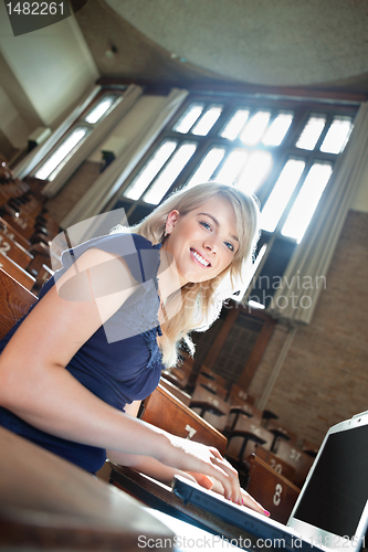 Image of College girl using laptop