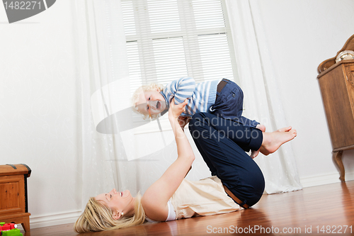 Image of Mother and baby playing