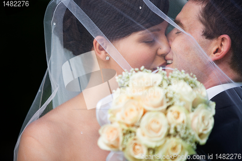 Image of Happy Married Couple Kissing