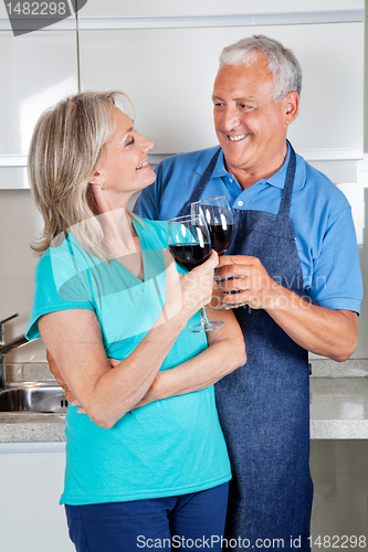 Image of Senior Couple Toasting Wine