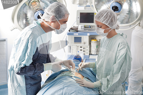 Image of Surgeons performing operation