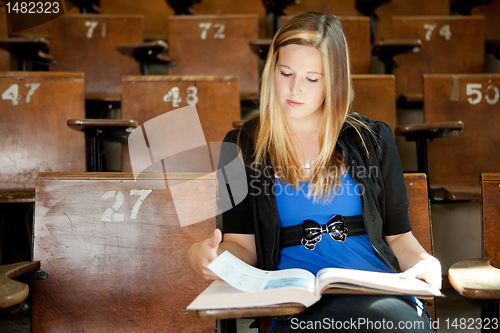 Image of College Girl with Text Book