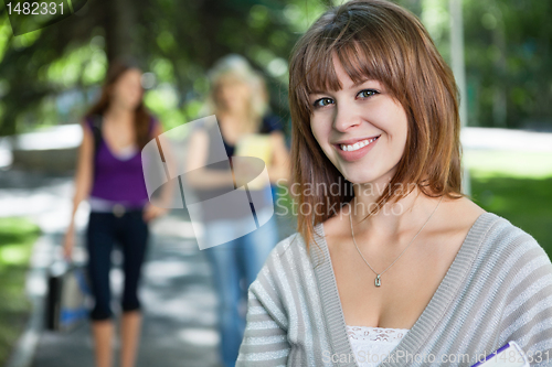 Image of Young college girl smiling