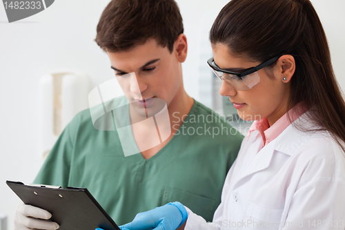 Image of Dentist with her assistant