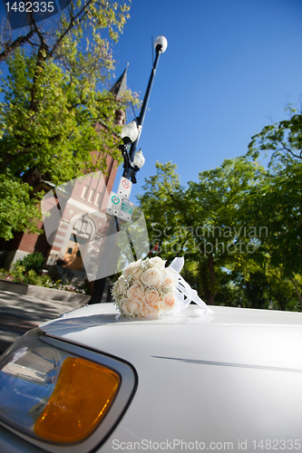 Image of Wedding Limo by Church