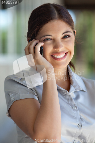 Image of Female Executive Talking on Cell Phone