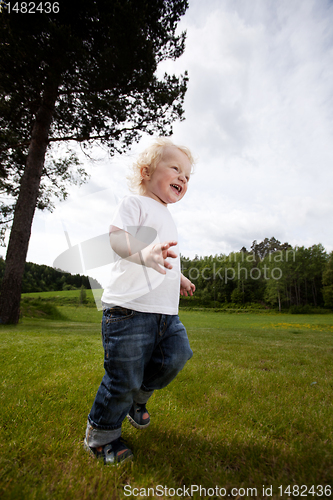 Image of Excited Cheeful Boy Running