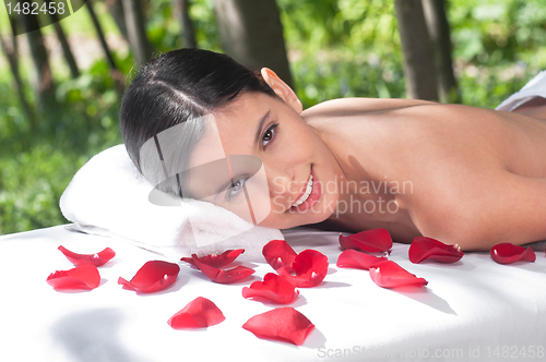 Image of Portrait of woman on massage table