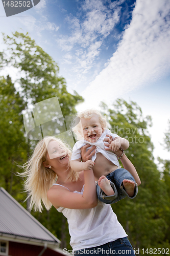 Image of Happy Child with Mother