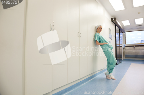 Image of Young woman doctor in corridor