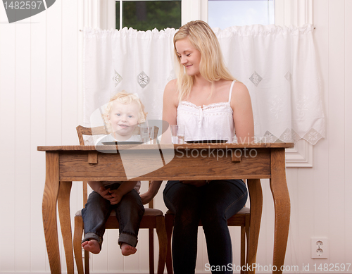 Image of Mother and Child at Table