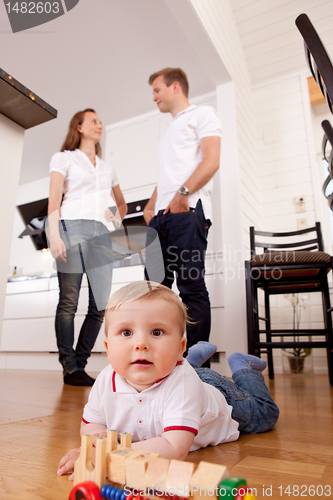 Image of Happy Child Playing on Floor