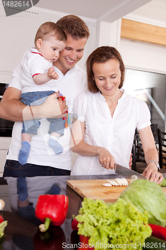 Image of Happy Family in Kitchen