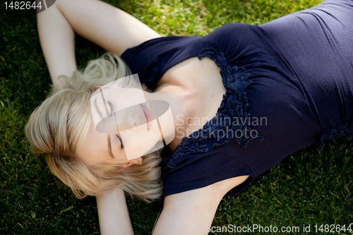 Image of Attractive Girl Student Relaxing Outdoors