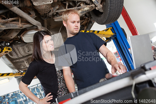 Image of Angry woman with mechanic