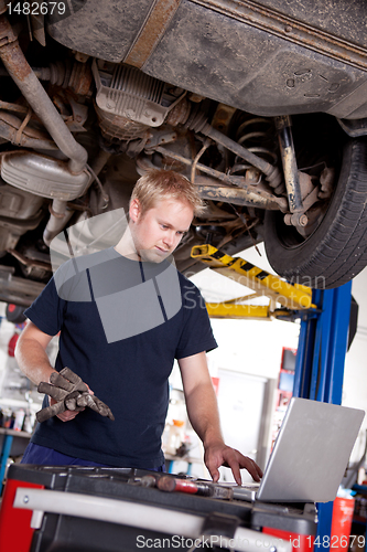 Image of Mechanic with Laptop