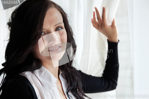 Image of Young Businesswoman Smiling