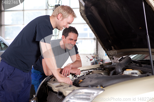 Image of Mechanics in Auto Repair Shop