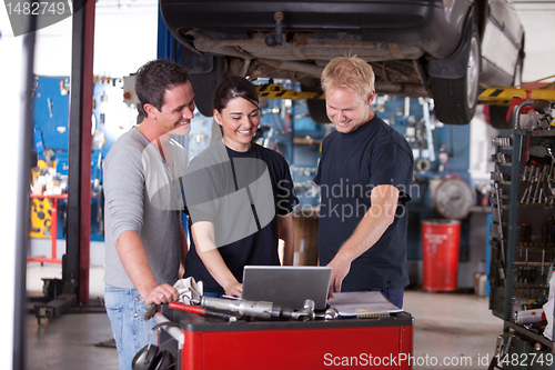 Image of Mechanics Using Laptop