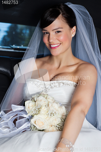 Image of Beautiful Bride in Limo