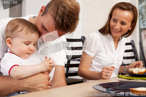 Image of Happy Family Eating Meal