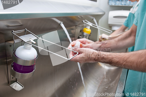 Image of Doctors washing hands