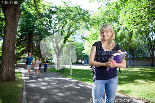 Image of Portrait of smiling college girl