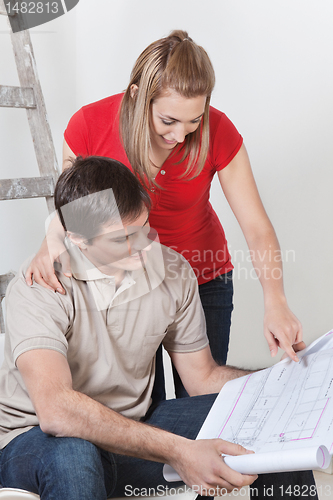 Image of Couple with Blueprints