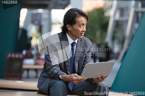 Image of Businessman with laptop