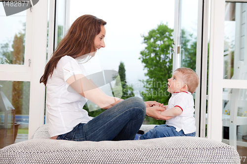 Image of Mother sitting with her child