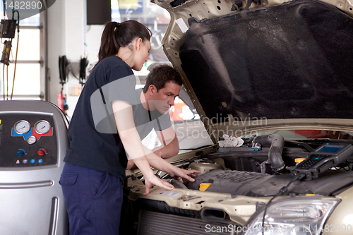 Image of Man Woman Mechanic