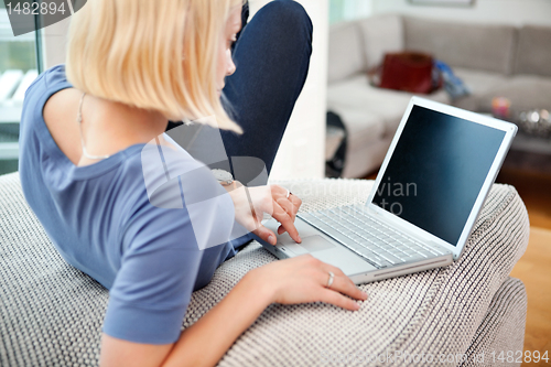 Image of Blond woman with laptop