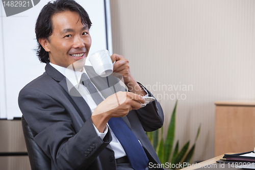 Image of Businessman Drinking Coffee