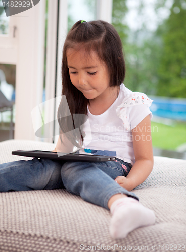 Image of Child with Digital Tablet