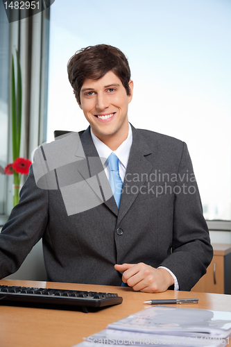 Image of Male Manager Smiling