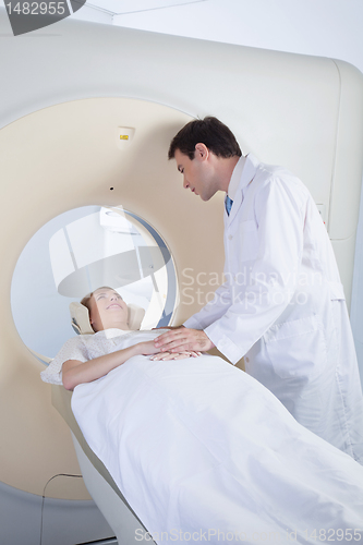 Image of Woman receiving CT scan test