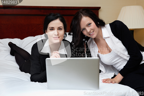 Image of Female Executives Working on Laptop