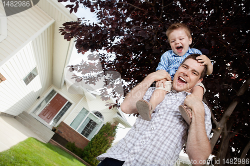 Image of Father with Toddler Son on Shoulders