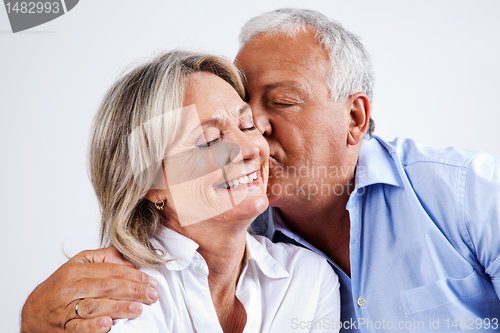 Image of Husband Kissing Wife on Cheek