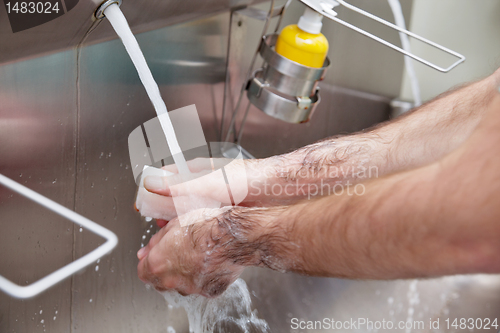 Image of Doctor washing hands