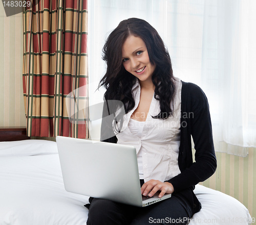 Image of Beautiful Female Using Laptop