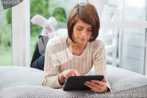 Image of Woman using tablet pc