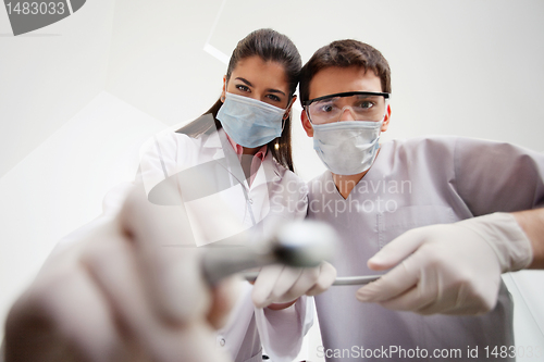 Image of Dentist and technician with dental tools